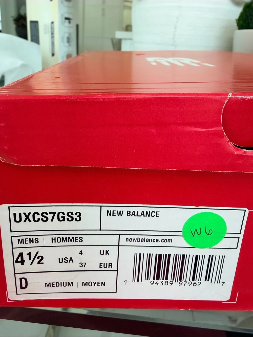 New Balance Men's Racing Shoes in Charcoal Gray with White and Red Accents